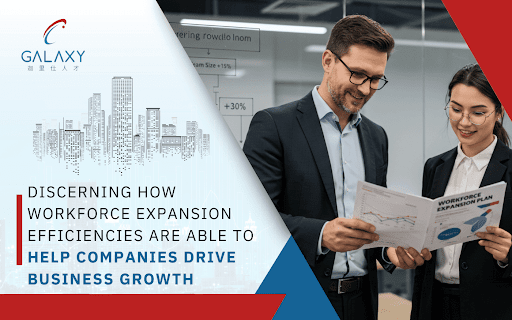 Business professionals reviewing workforce expansion plan at Galaxy Group